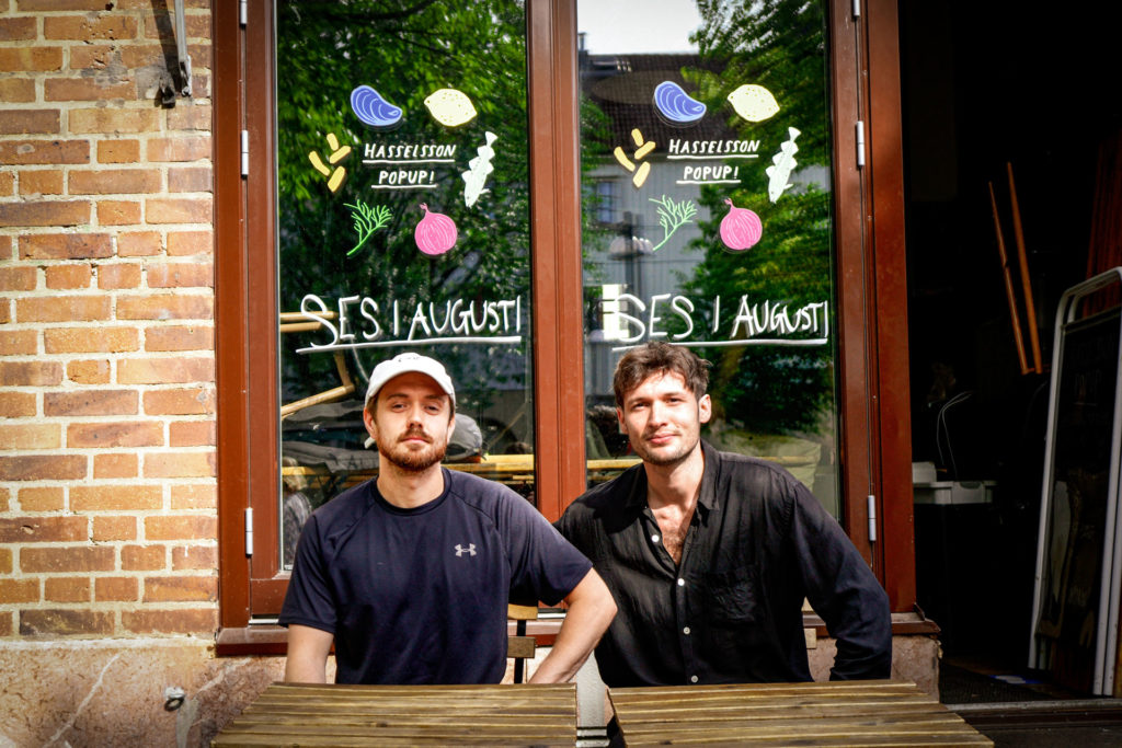 Adam Axelsson and Oliver Bull, two owners of Hasselssons - a seafood restaurant Pop Up in Majorna, Gothenburg. They have collaborated with Beerbliotek, a Swedish Craft Brewery to make their Hasselssons Li'l Pils beer.