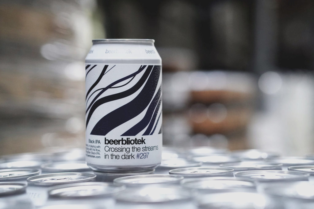 A can of Crossing the streams in the dark, a Black IPA, brewed in Gothenburg, by Swedish Craft Brewery Beerbliotek, during the packaging day.