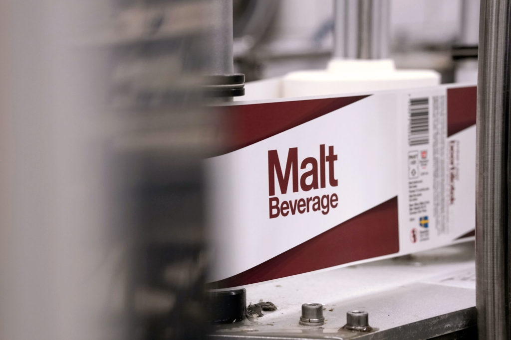 Malt Beverage, an Amber Lager, getting labels on during packaging day. This beer was brewed by Swedish Craft Brewery Beerbliotek.