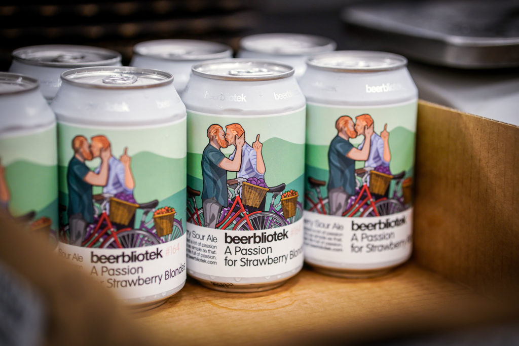 Cans of "A Passion for Strawberry Blondes", a Sour Ale with Passion Fruit and Strawberries. Brewed by Swedish Craft Beer brewery, Beerbliotek, in Gothenburg.