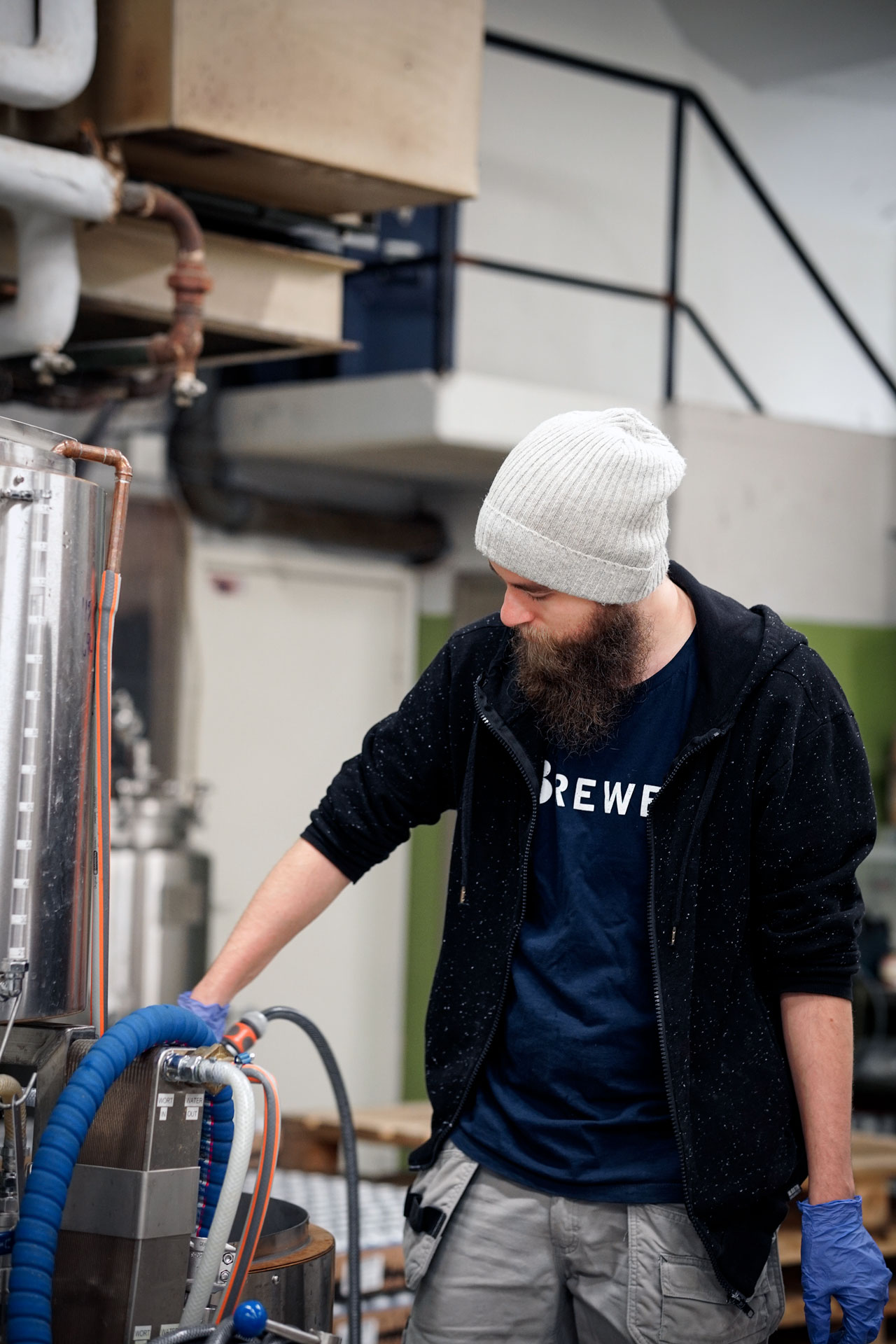 Johannes Blomqvist, Beerbliotek's latest intern, brewing a Rauchbier as part of a one-time, limited experimental brew by Beerbliotek, a Swedish Craft Brewery Gothenburg, Sweden.