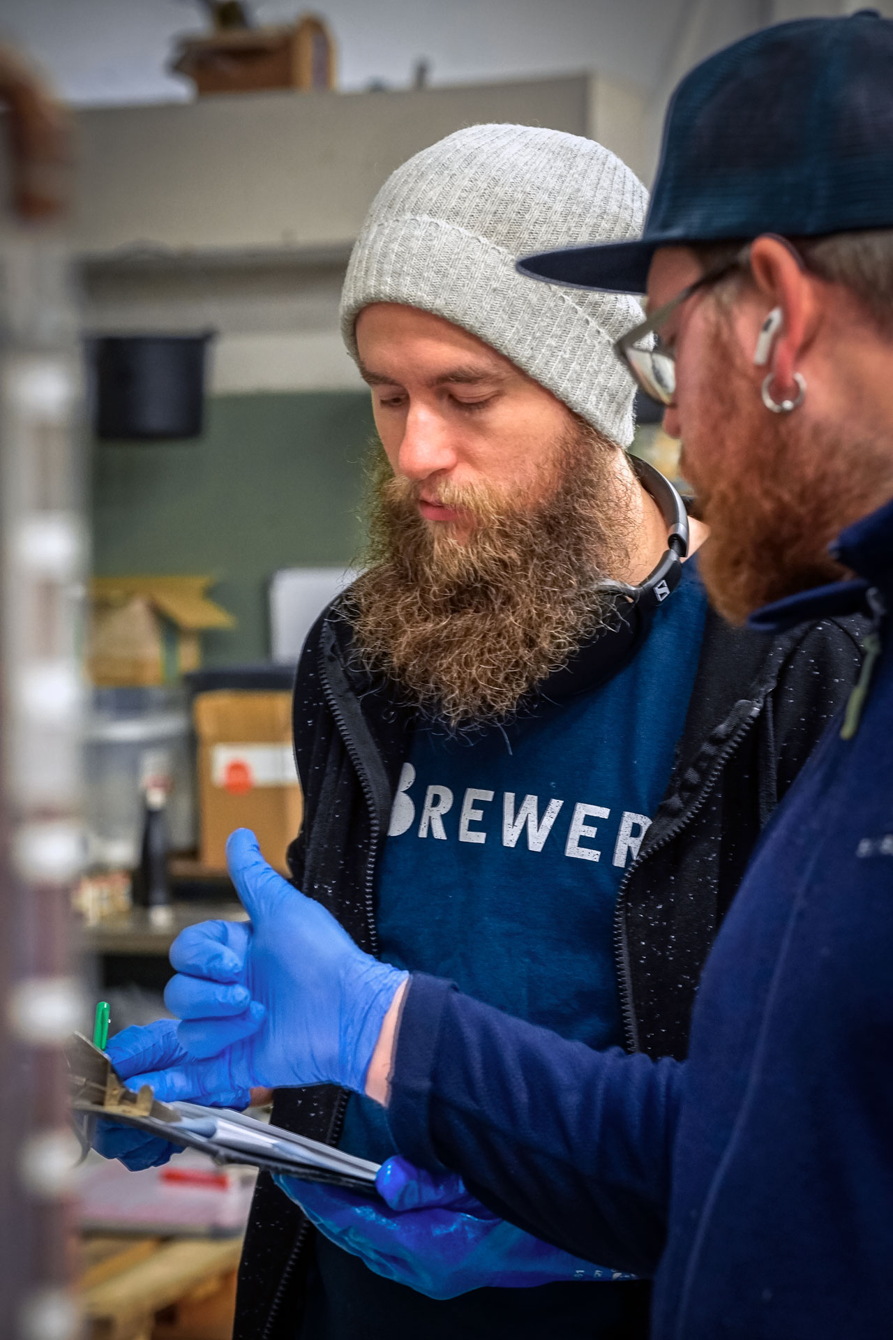 Johannes Blomqvist, Beerbliotek's latest intern, getting help from Beerbliotek Brewer Axel, to brew a Rauchbier as part of a one-time, limited experimental brew by Beerbliotek, a Swedish Craft Brewery Gothenburg, Sweden.